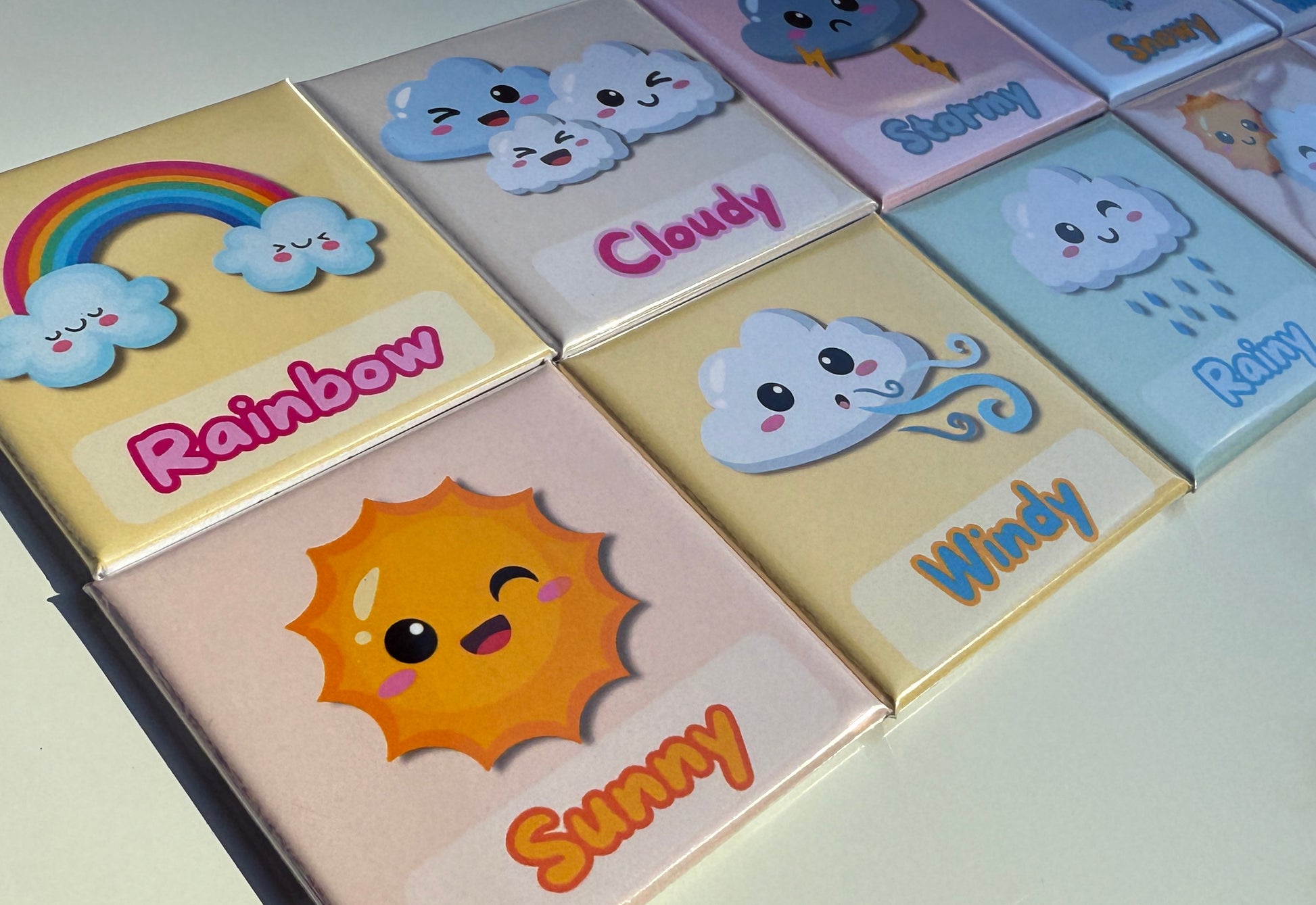 Full 10-piece weather magnet set including Sunny, Cloudy, Rainbow, and more