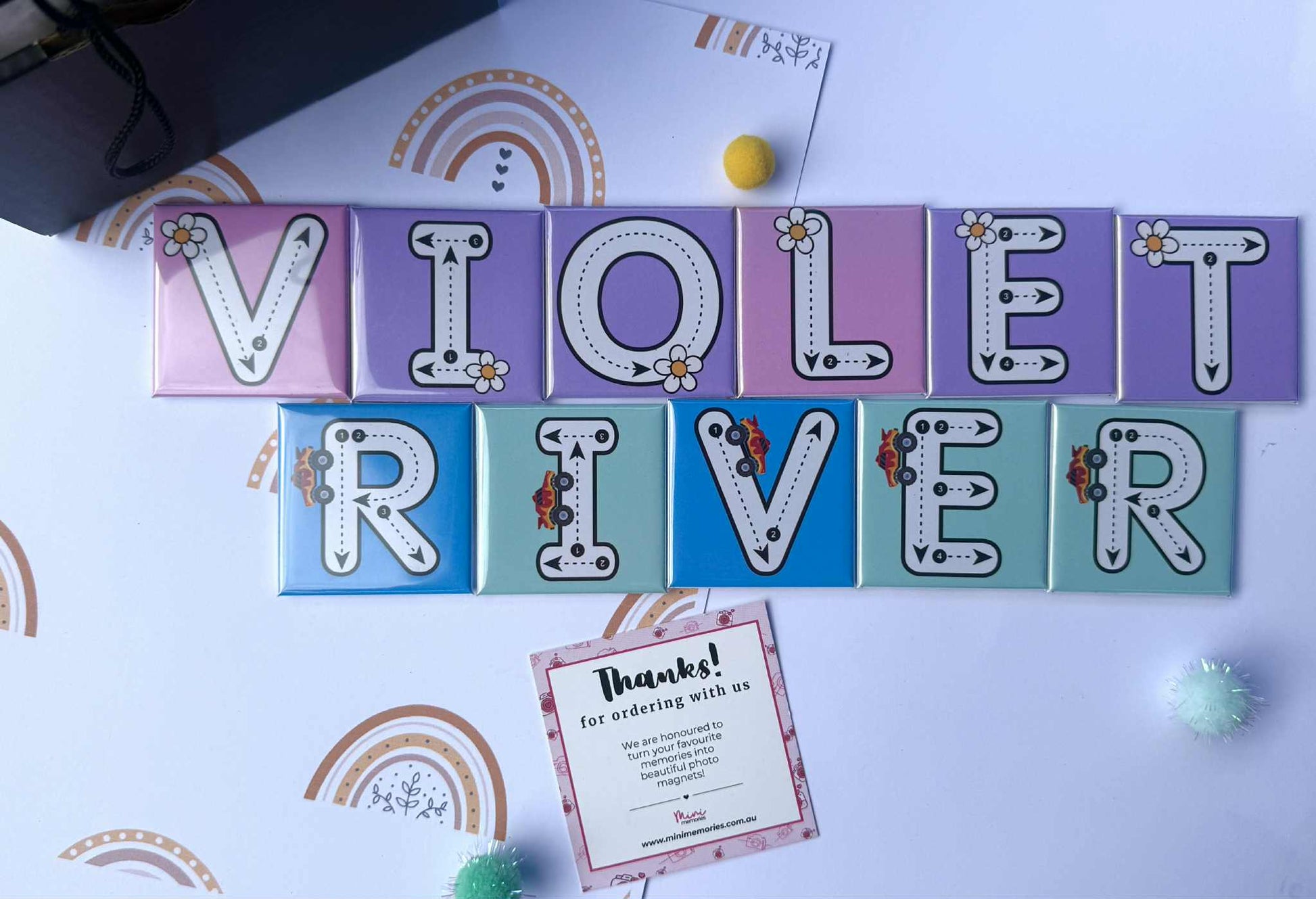 Colorful letters spelling 'VIOLET RIVER' on a white background with decorative elements.